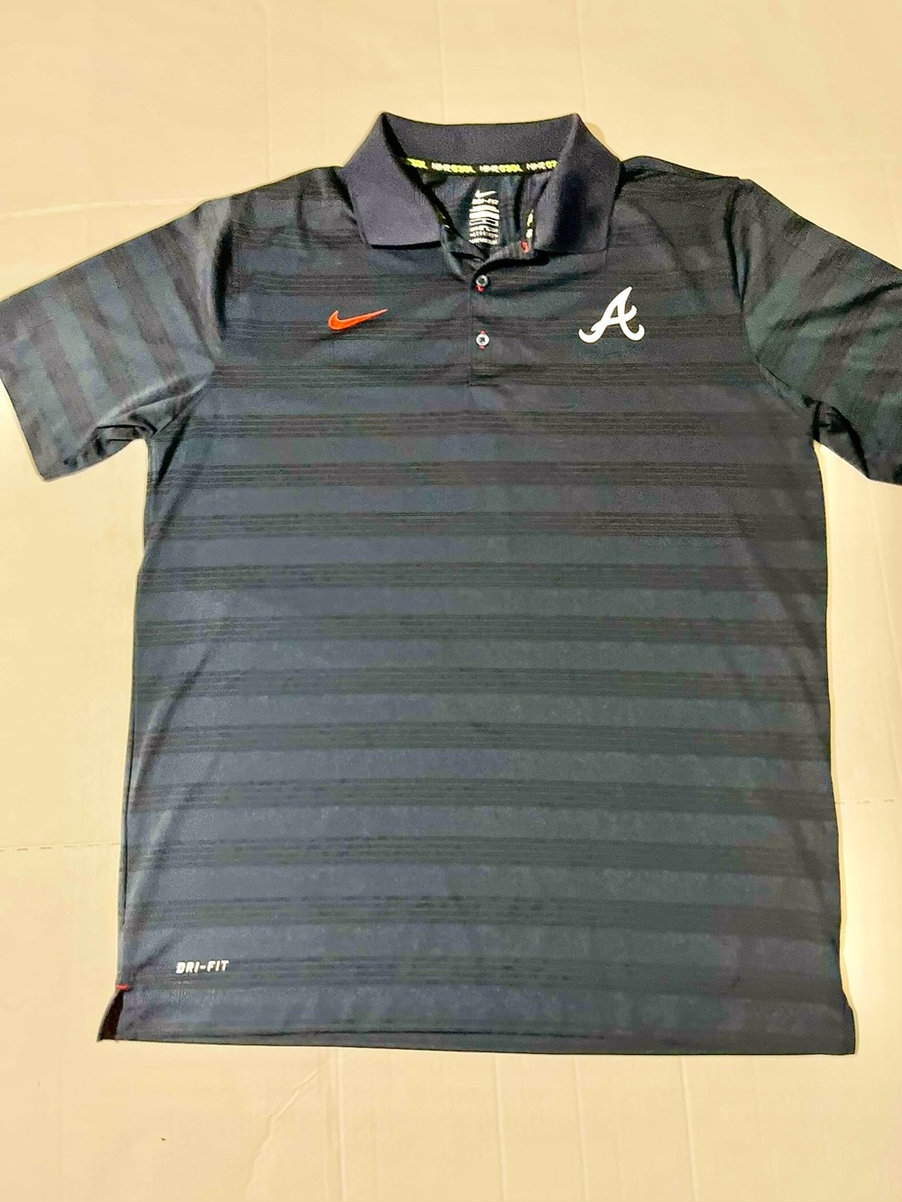 Nike Men's Navy Blue Atlanta Braves Polo with Red Swoosh